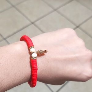 This is a red bracelet see the pictures for more information